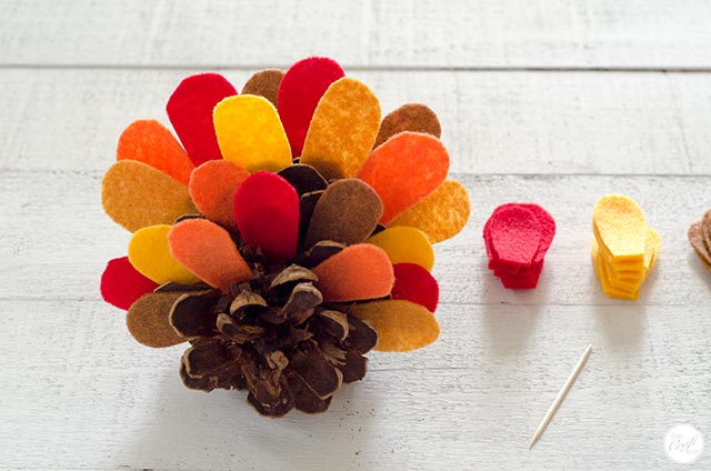 pinecone and felt feathers