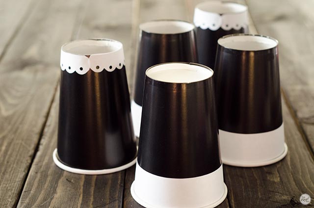 trim embellishments on pilgrim paper cup hats