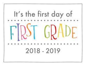 back to school sign rainbow colors first grade